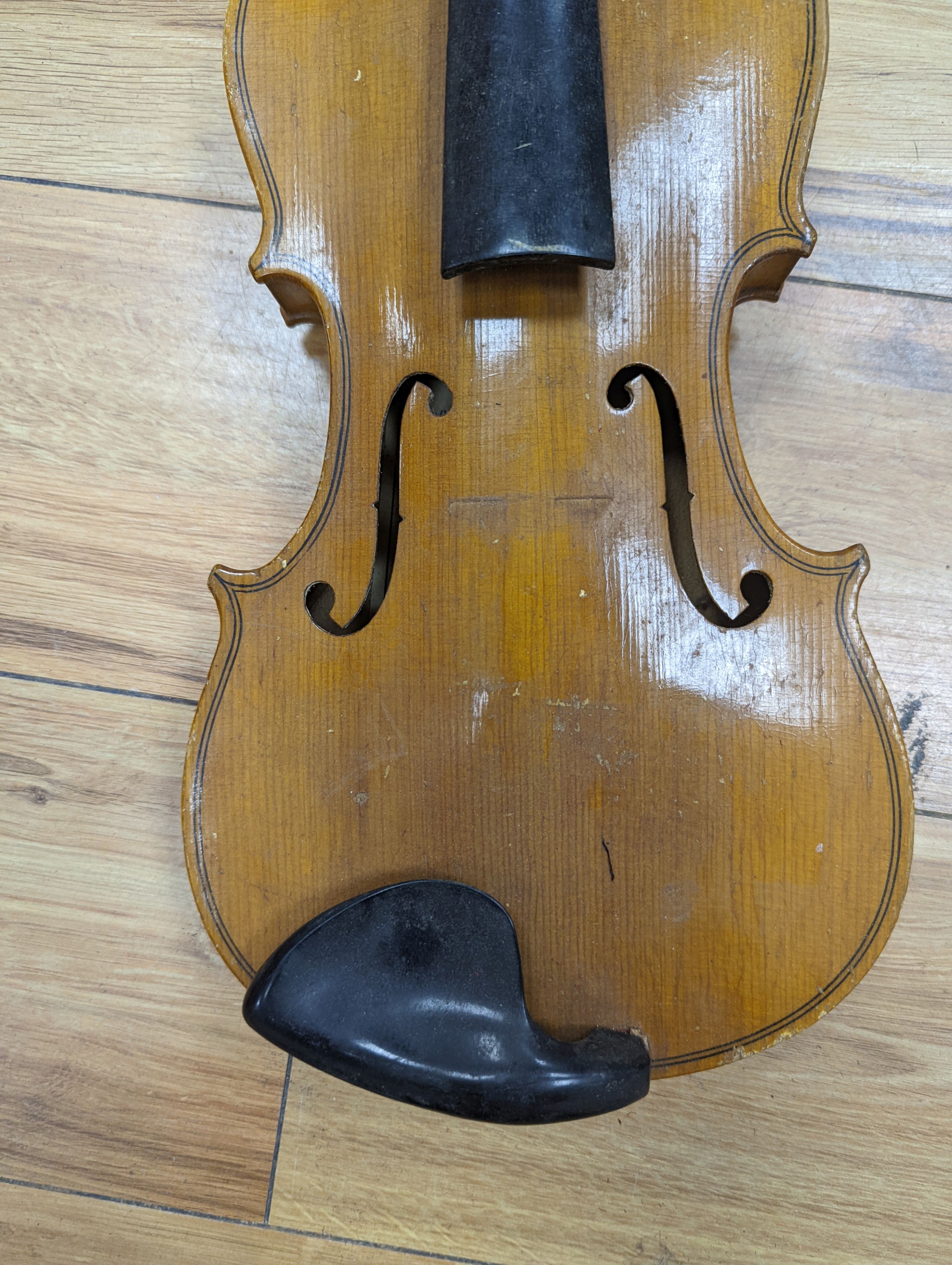 A violin and bow, various records etc